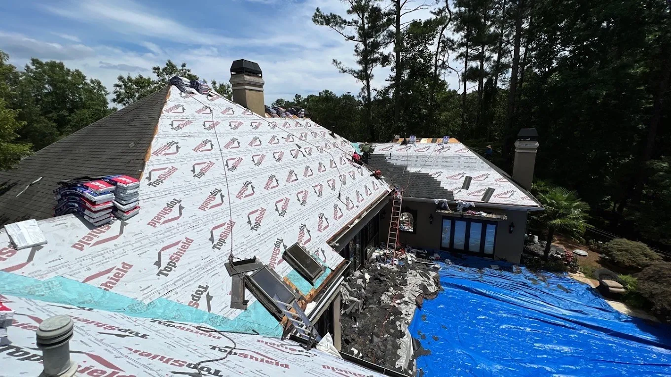 Rad Roofs professional roofers replacing shingles